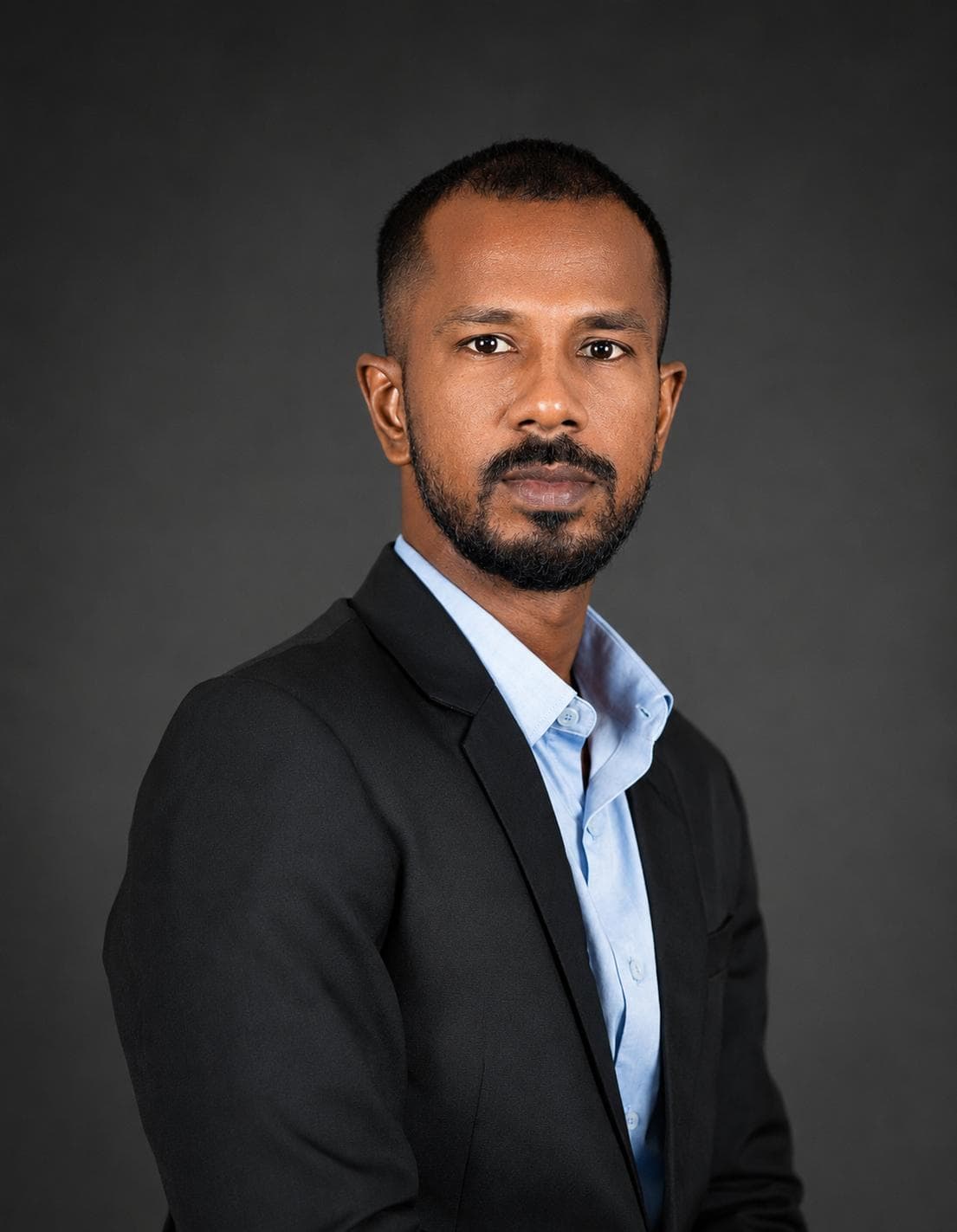 Portrait of H. Ifraz Isfahan, Managing Director of Master Freight Agencies.